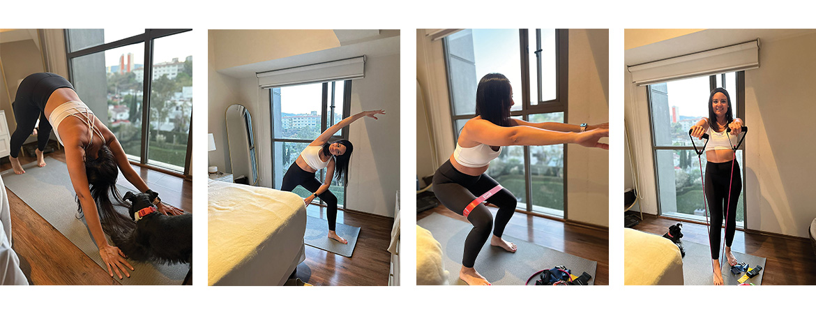 A photo of a woman doing exercises inside an apartment.
