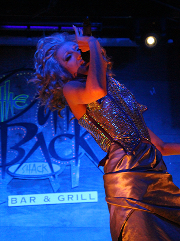 A photo of a drag performer on stage.